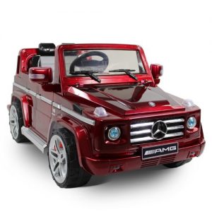 A small electric-powered toy car for your young one who is ready to go. A red jeep for girls, very shiny and new. 