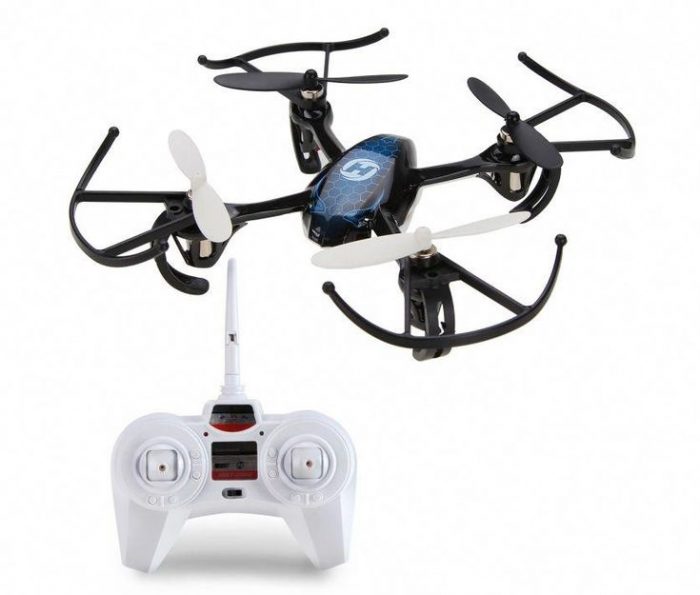 There is a sleek black drone equipped with a white remote control. This flying toy has a contemporary design, setting it apart from conventional toys. These kinds of toys look modern. 