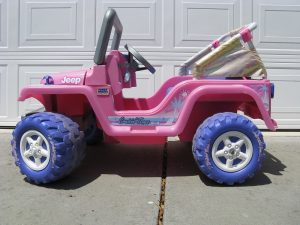 a nice pink electric-operated toy car