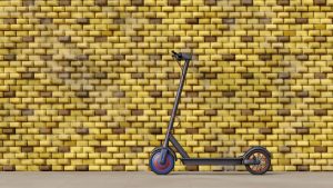 Parked scooter resting peacefully on a city sidewalk, ready for its next journey and awaiting the return of its owner.