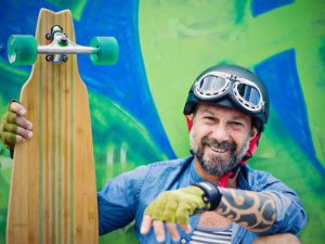 A happy man ready to ride his board